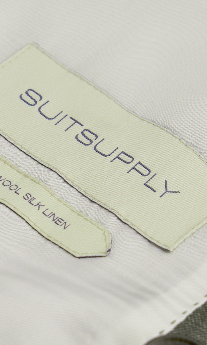 Suitsupply P6621 mid-green stripe Havana suit with Fellini trousers