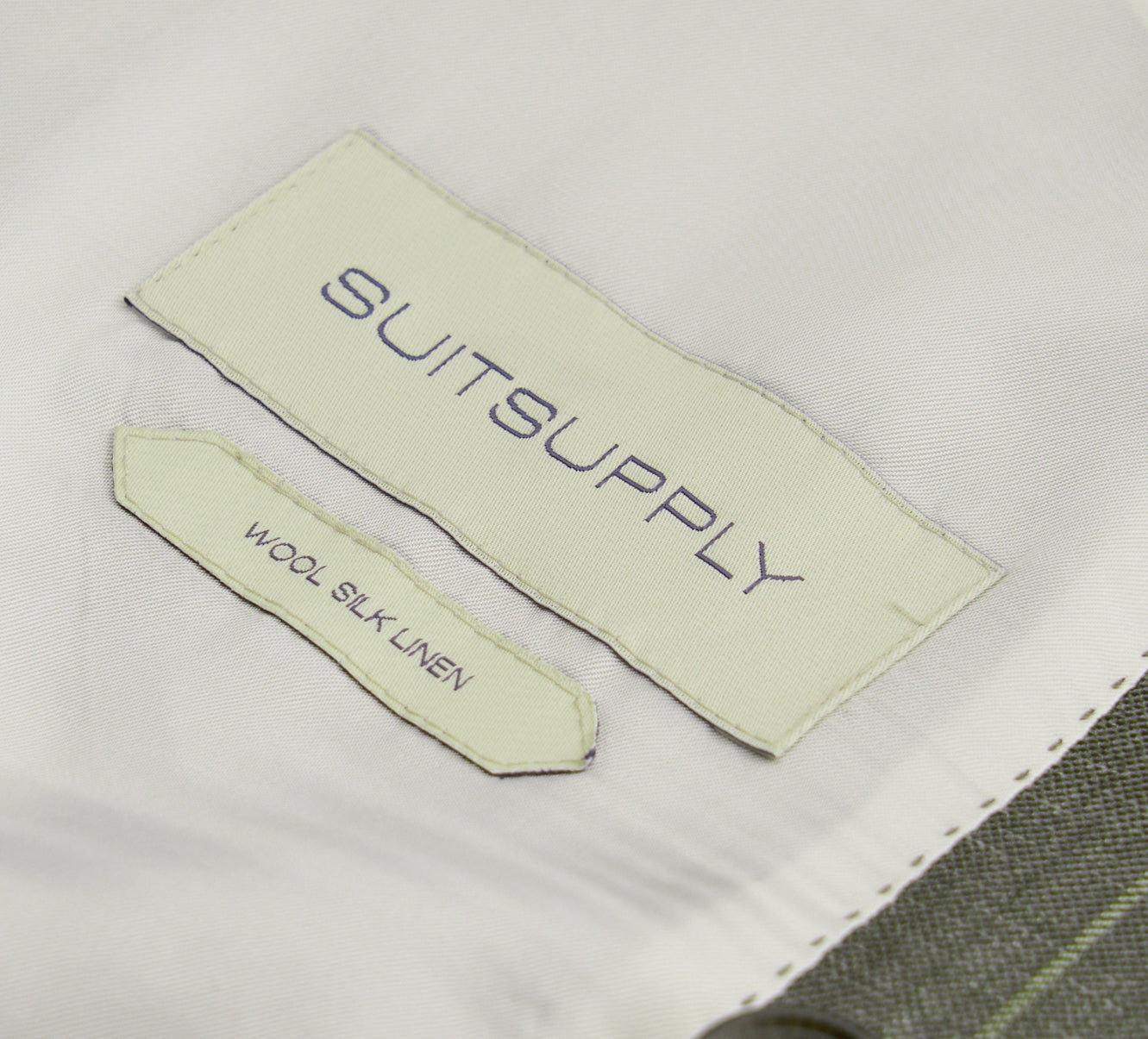 Suitsupply P6621 mid-green stripe Havana suit with Fellini trousers