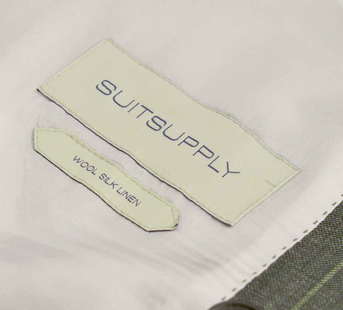 Suitsupply P6621 mid-green stripe Havana suit with Fellini trousers