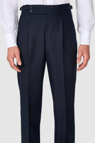 SUITREVIEW Elmhurst navy herringbone wool suit tailored in a slim fit